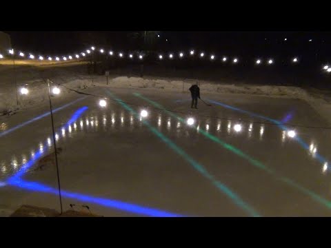 Hockey rink with under ice lighting