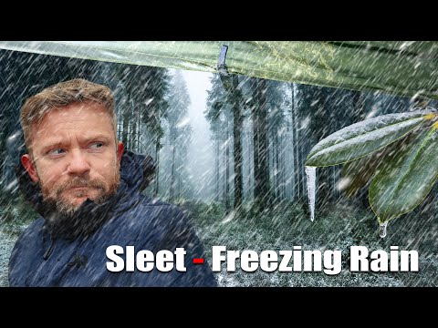 Camping in a Wintery Mix Storm with a MASSIVE Tarp Shelter