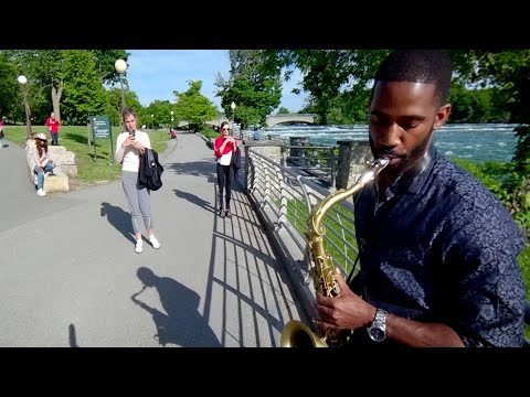 Street Saxophone Performance of "I Feel It Coming"