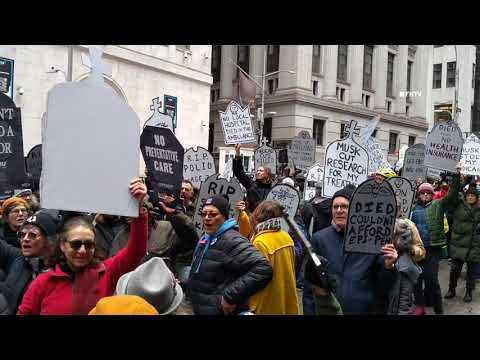 Hundreds March to "Stop The Cuts" in NYC