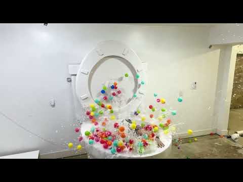 GIANT CANNONBALL into the Play Balls in the Worlds Largest Toilet