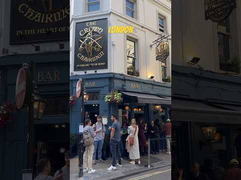 People are getting ready for the #England match in front of the #pub #london #soho #walking