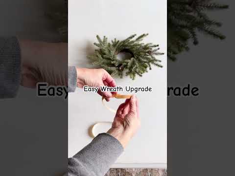 Easy Wreath Upgrade | Christmas wreath | gold bell | velvet ribbon | dining chair | holiday decor