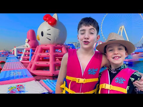 Water Park Adventure for Kids 💦 World’s Largest Inflatable WaterPark ☀️ Family Fun