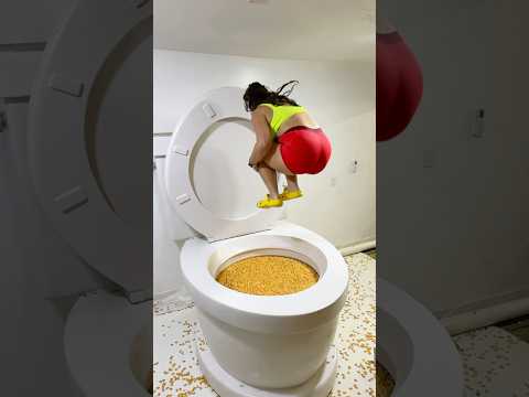 HUGE BACKWARDS JUMP into the Worlds Largest Toilet Filled with GOLD FISH #shorts