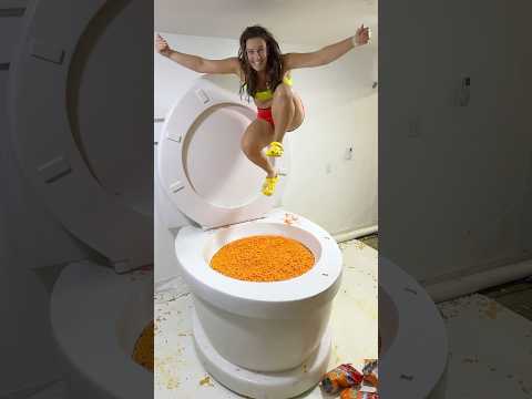 SUPER HIGH JUMP and Going Under in the Worlds Largest Toilet Filled with CHEETOS #shorts