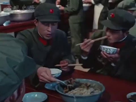 In the 1970 s  the PLA soldiers had a meal. Eight people sat at a table and shared a big pot of ric