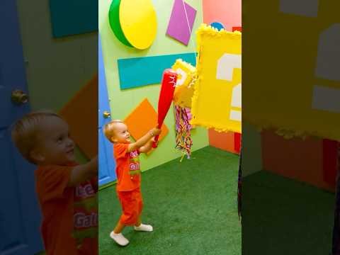 Chris and Mom are playing pinata