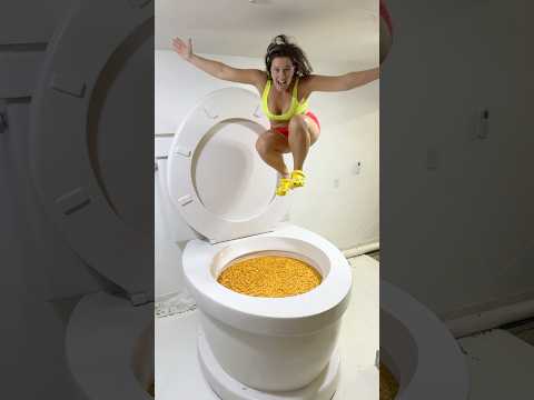 Going Under and JUMPING into the Worlds Largest Toilet Filled with GOLDFISH #shorts