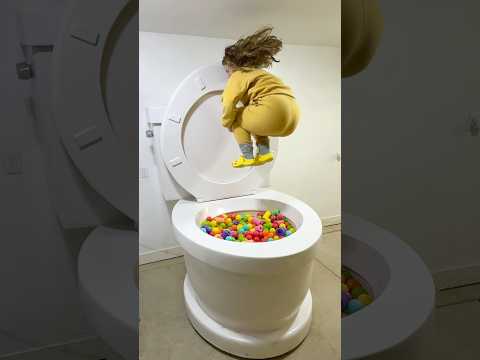 HUGE BACKWARDS JUMP into the Worlds Largest Toilet in Slow Motion #shorts