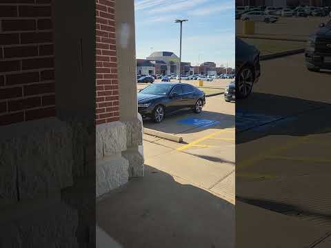 Wells Fargo customer parks into the handicap space a little And leaves the dog in the car Windows up