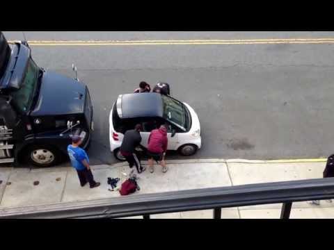 5 Guys illegally lift a smart car!