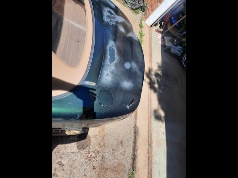 Painting a Miata outdoors without a spray booth.