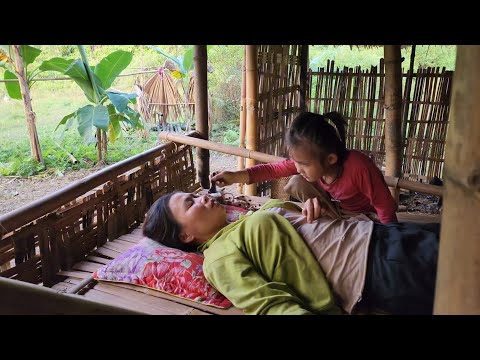 The daughter takes care of her sick mother alone and cooks porridge for her mother