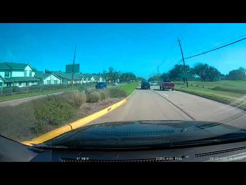 A minivan in Missouri City waits patiently for traffic to close in before casually cutting them off