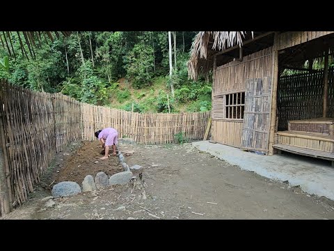 Poor girl, took stones to build a small garden frame and added more vegetables.