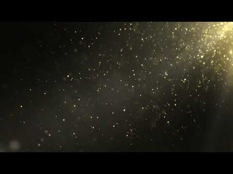 Flying Gold Dust Particles with Bokeh On A Dark Background Loop Animation | Free HD Version Footage