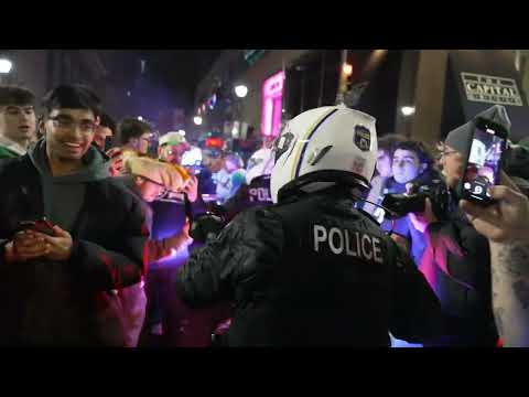 Eagle Fans CLIMB Cars and Poles, Falling, One Cop Assaulted - Philadelphia