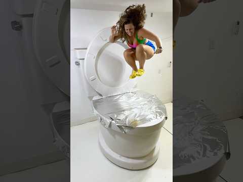 SUPER HIGH TUCK JUMP into the Worlds Largest Toilet Covered in Tin Foil #shorts