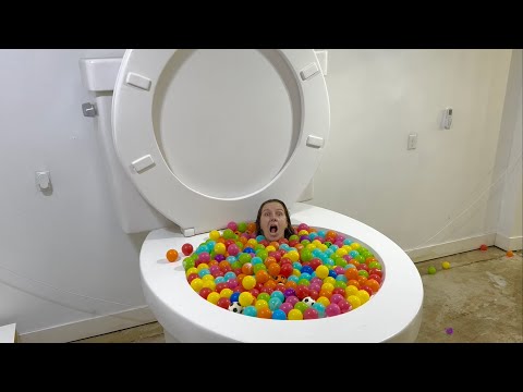 Going Under and JUMPING into the Worlds Largest Toilet Play Ball Pool with Splash