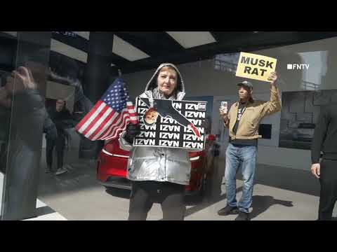 'Rise and Resist' Protesters OCCUPY Tesla Showroom in Manhattan