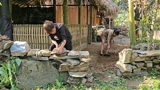 Homeless boy and poor girl build walls from rocks, tend vegetable garden