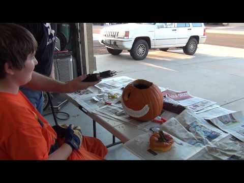 Cool Dad Helps with Pumpkin Carving